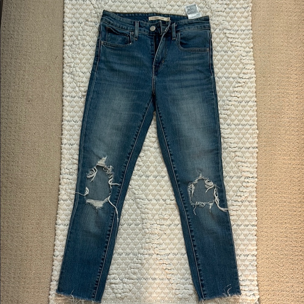 Distressed Blue Jeans